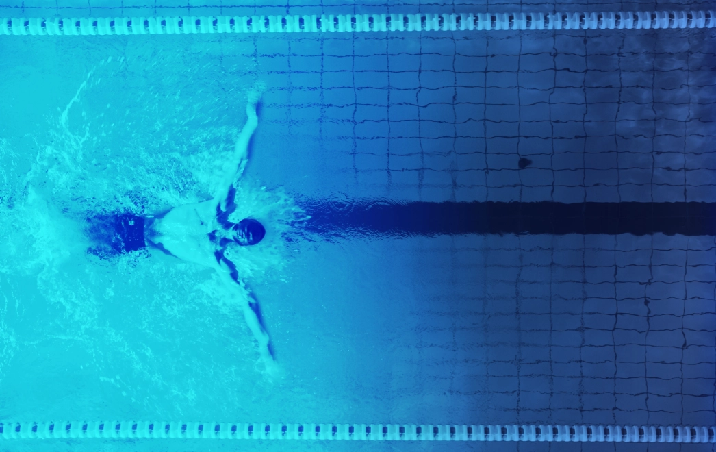 Stylized Image of a swimmer swimming laps.